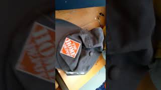 Holding a Home Depot Hat for 1.5 Seconds