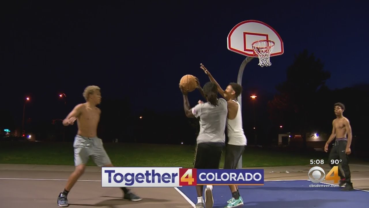 newspaper mockup Police Officer Joins Midnight Basketball Game