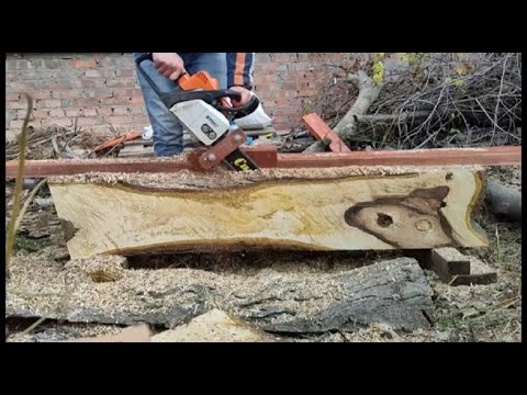 Fabriquez vos planches a la Tronçonneuse avec une gruminette faite maison  (Chainsaw Mill) 