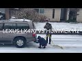 Tug of war between 2000 Lexus 470 vs 2003 Hummer H2 in snow and ice