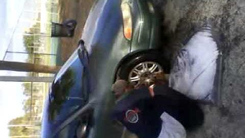 Man washing Car out of a Clear Garbage Bag!