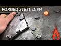 Blacksmithing  making a forged steel dish