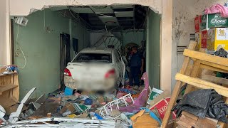 Blacked out driver crashes through wall of Pattaya home, traps and injures woman showering.