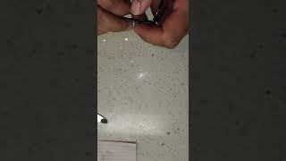 Replacing a spring hinge using a self-aligning screw