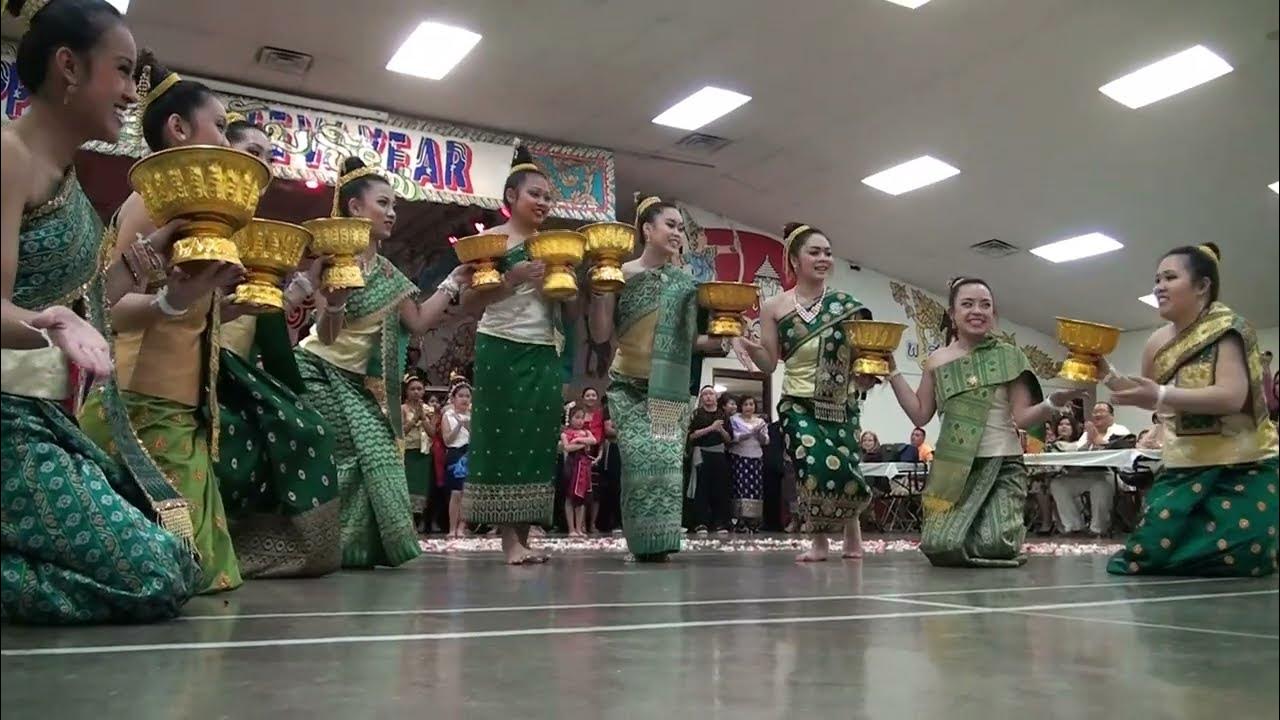 Lao traditional dancing- at Lao temple/hall during the Lao new year, in ...