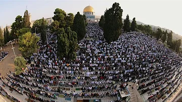 Palestinian worshippers perform Eid prayers at the Al-Aqsa mosque compound | AFP