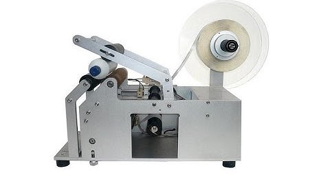 Semi automatic small glass bottle labeling machine working video manual adhesive sticker labeller