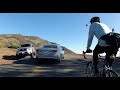 Impatient Driver passes cyclists around blind corner forcing truck into ditch