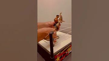 Powerhouse Hobbs hits Spinebuster on Jungle Boy Jack Perry AEW Wrestling figure toy matches Finisher