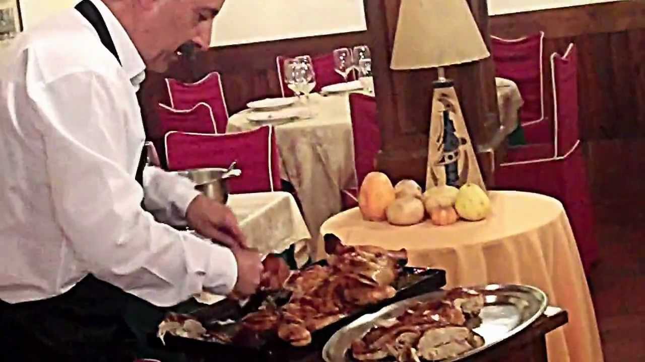 Sampling Suckling Pig in Segovia, Spain