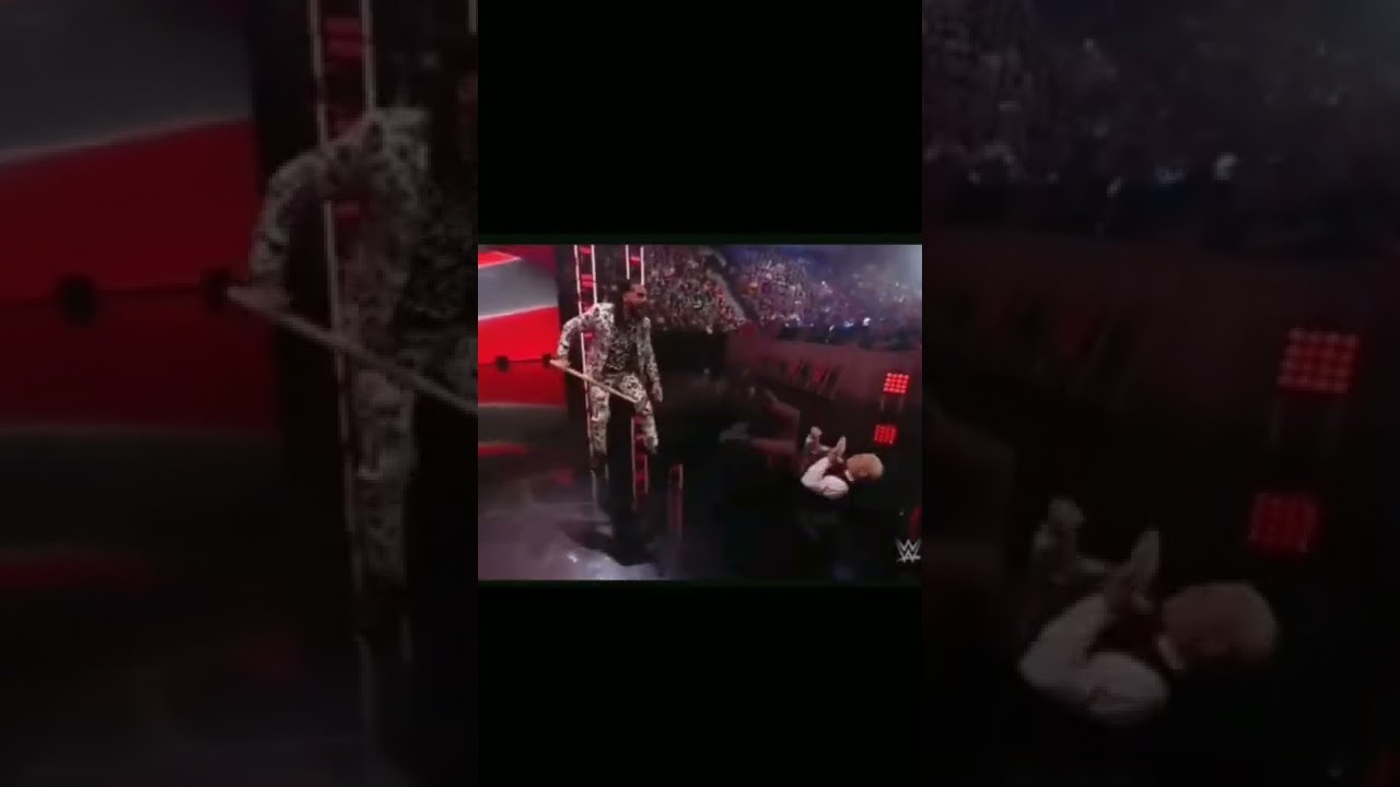 Seth “Freakin” Rollins attacks an injured Cody Rhodes 