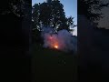 Lighting  huge pile of brush with a canon
