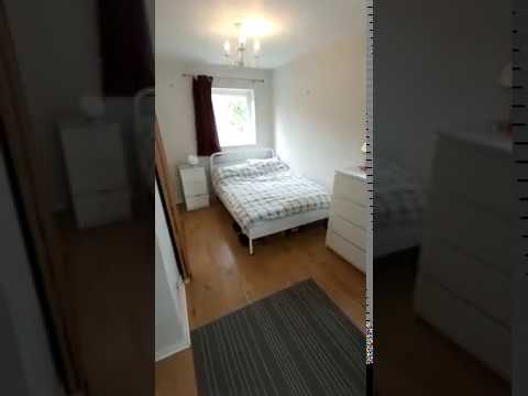 Video 1: private living room with bedroom visible through door