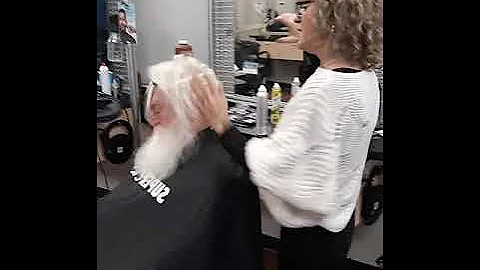 Hairdresser gets Santa ready at SuperCuts!!!!