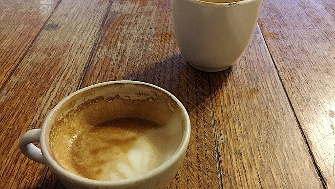 Cuban Coffee Or Espresso In A Small Glass Cup by Stocksy