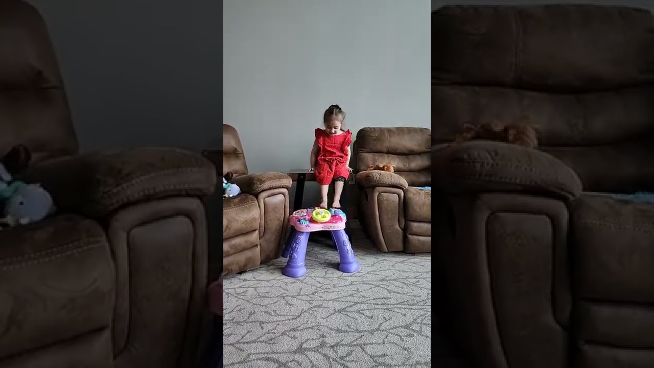 CUTE 3 YEAR OLD GIRL SINGING AND JUMPING Shorts Toddler