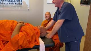 Tibetan Monk Gets His 1st Ring Dinger® From Houston Chiropractor Dr Gregory 