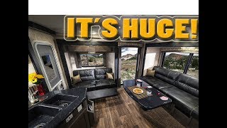 The BIGGEST Slide In Truck Camper EVER  HOST MAMMOTH  TRIPLE POP OUT!