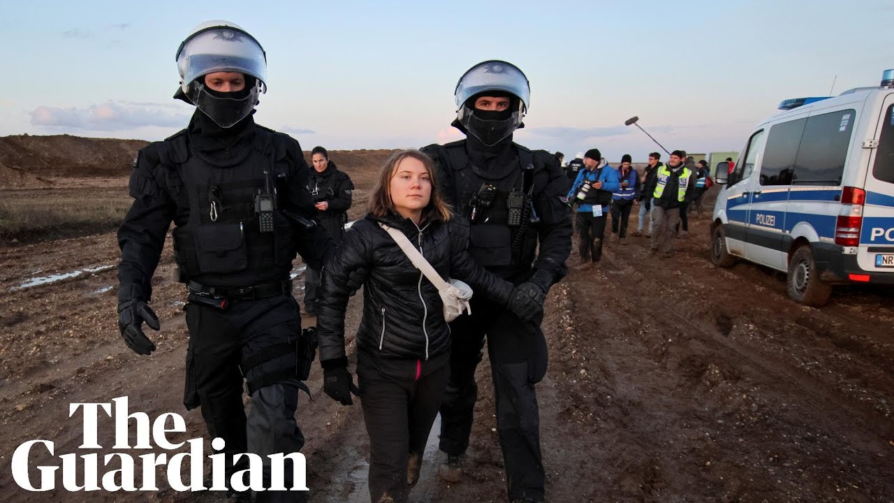 Riot police carry Greta Thunberg away from German coalmine protest
