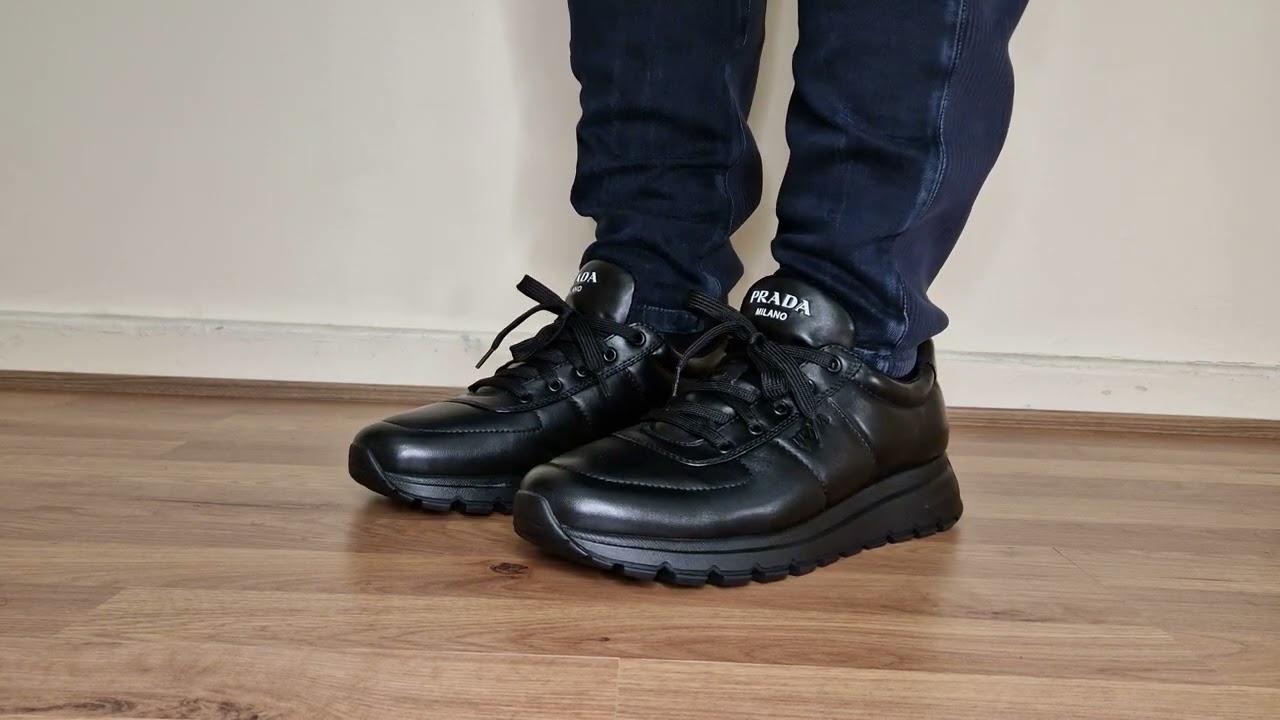 PRADA RUNNERS TRIPLE BLACK ON FOOT 