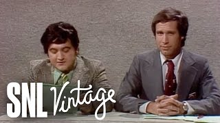 Weekend Update: John Belushi on March Weather - SNL