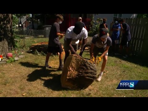Roosevelt football team cleans up yard for man with disability
