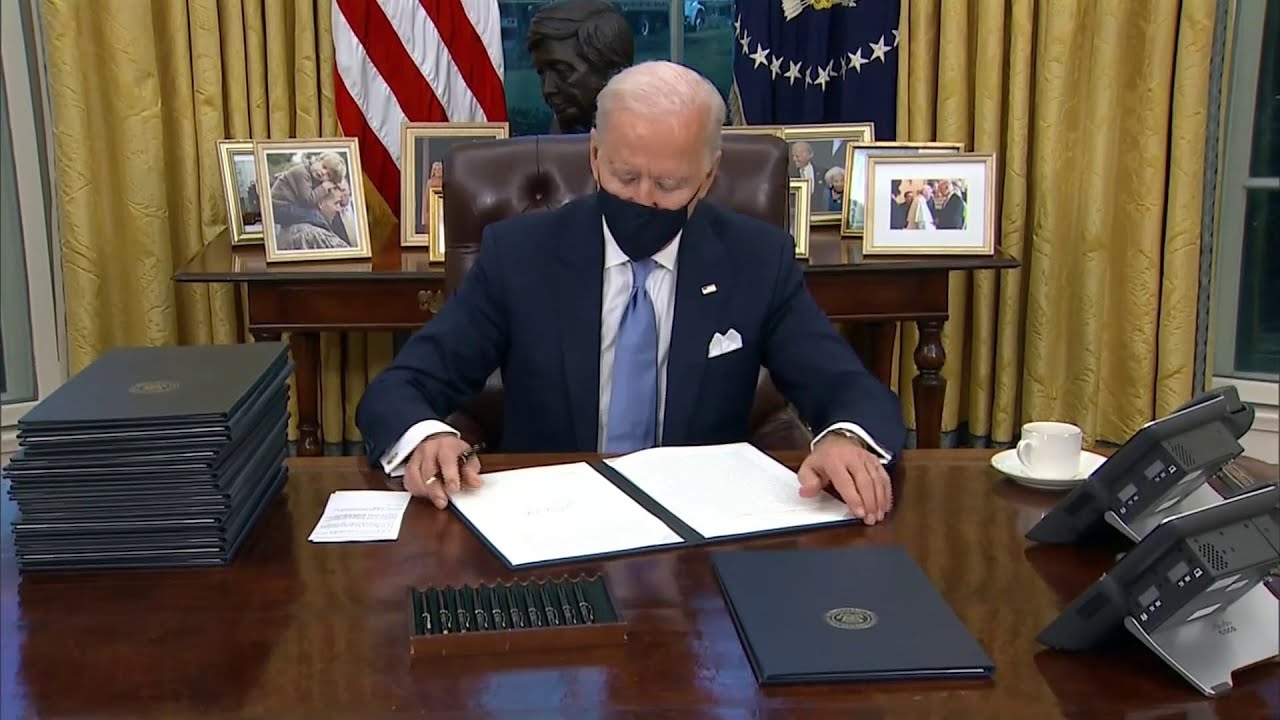 President Joe Biden signs 17 executive orders