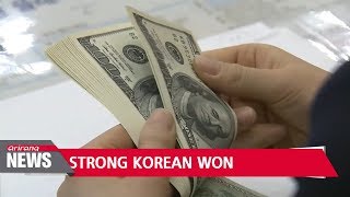 Dollar-to-won exchange rate falls below 1,100