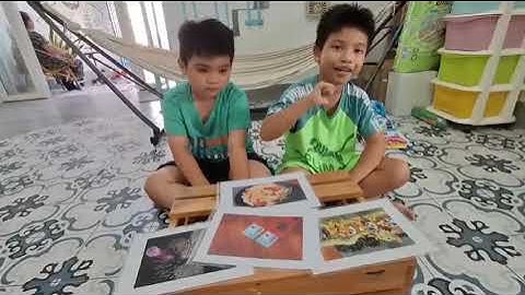 Tiếng Anh Giao Tiếp Thiếu Nhi Tại Phan Thiết: Kevin and Roy talking about Tet Holiday