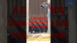 A KID crawls under train car just before it starts to move!!!