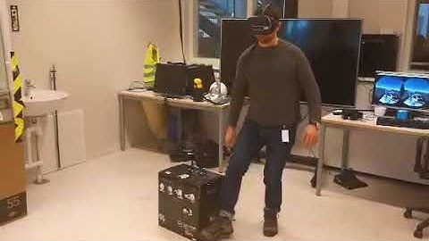 Geomagic touch controls UR10 robot with VR