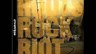 Video voorbeeld van "Skindred - Roots Rock Riot [Lyrics]"