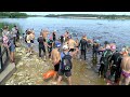 Массовый заплыв на городском озере на День физкультурника