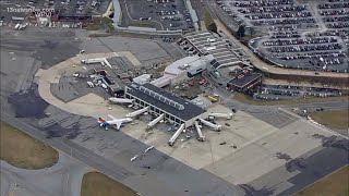 Man arrested after explosive found in checked luggage