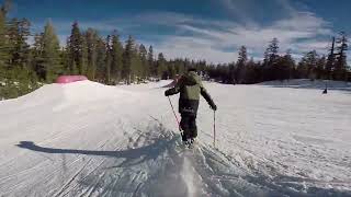 Boy grinds rail on snowboard and falls on a sensitive area