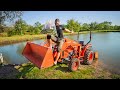 Stocking Pond With TRACTOR Full Of SHINERS!! (thousands of fish)