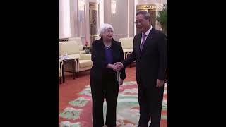 China's Premier Li shaking hands with US' Yellen in Beijing