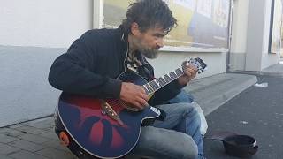 Video thumbnail of "Tomas (homeless) playing Metallica, Hendrix, Alice in Chains, Nirvana in front of supermarket"