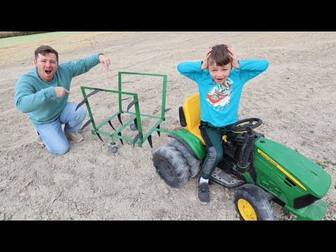 Using kids tractor with huge plow in the dirt | Tractors for kids working on the farm