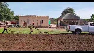 Toyota Hilux used as Tractor to plough fields in Zimbabwe