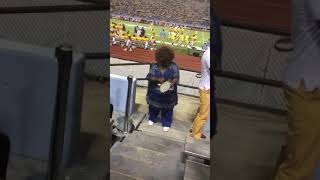 Grandma Shows Off Impressive Tambourine Skills at Football Game screenshot 5