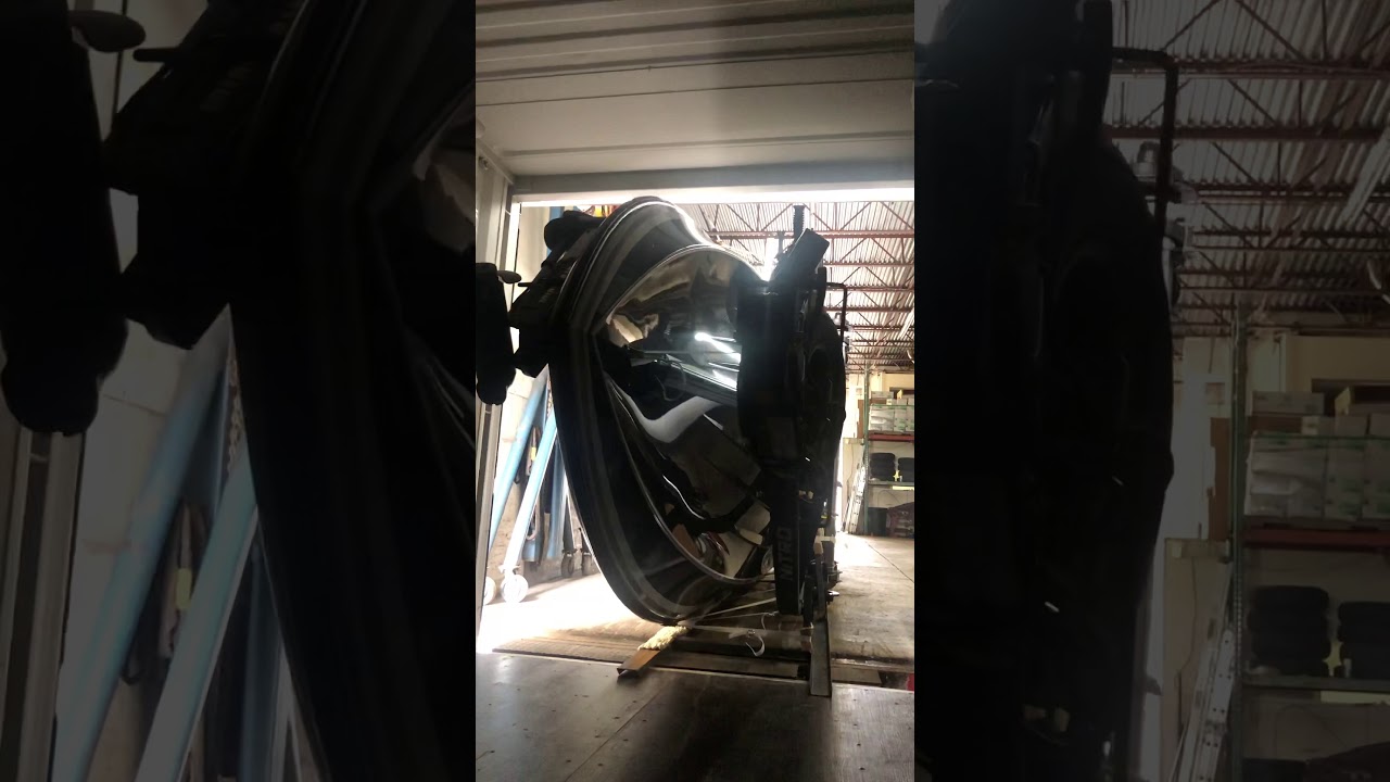 Boat shipping from USA, container loading, custom made cradle