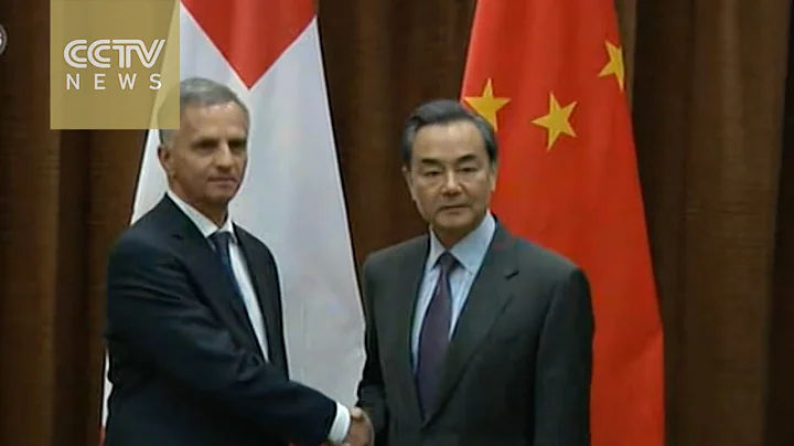 Wang Yi meets with Swiss foreign minister Didier B...