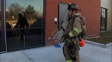 Firefighter Training: High-Rise Hose Deployment for Apartment Building Fire Operations