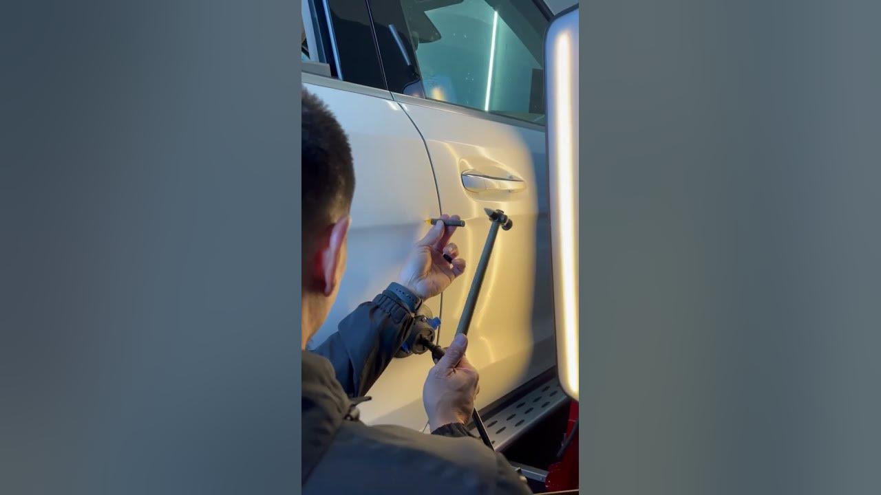 ASMR - Is he tapping to a song playing in his head? #paintlessdentrepair #carrepair #tap