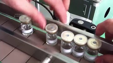 Vertical automatic labeling machine for small bottle 立式小圆瓶自动贴标机