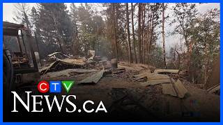 Evacuee's home still standing