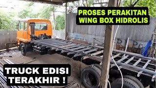 proses perakitan  hiwing box hidrolis untuk truck yang sudah mau distop produksinya