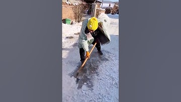 the process of clearing the ice layer on the road #shorts