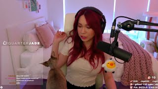 Jodi's cat Genji bites her during stream